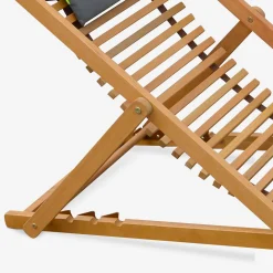 Pair of slatted wooden deck chairs