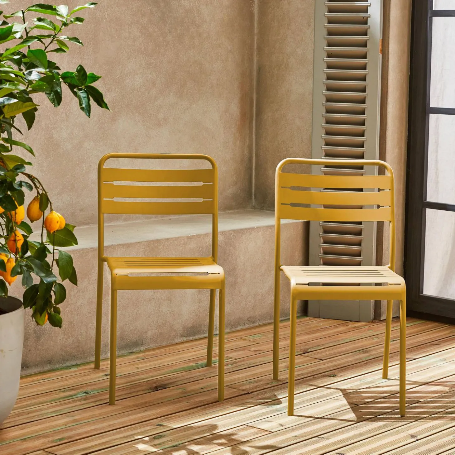 Pair of steel and stackable garden chairs
