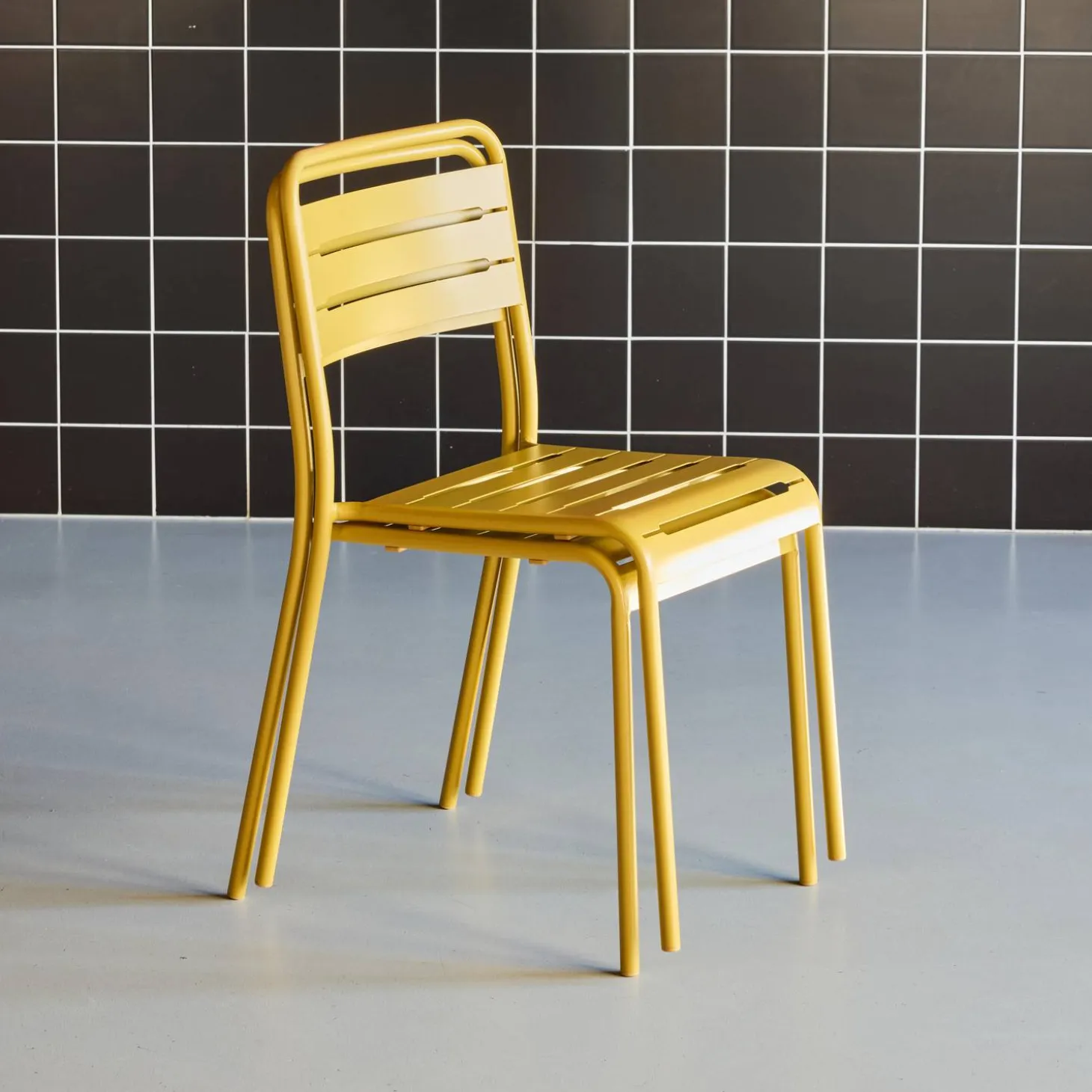 Pair of steel and stackable garden chairs