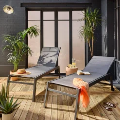 Pair of textilene and aluminium sun loungers