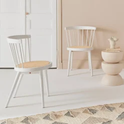 Pair of wood and cane dining chairs
