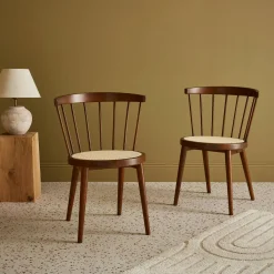 Pair of wood and cane dining chairs