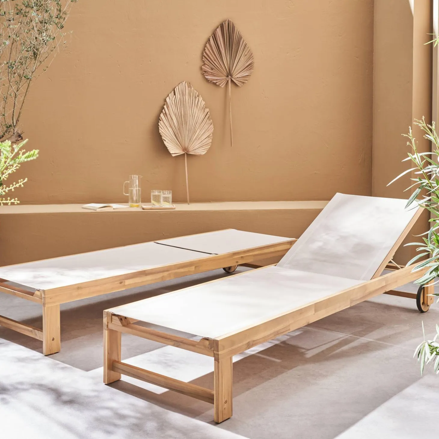 Pair of wooden and multi-position sun loungers with wheels