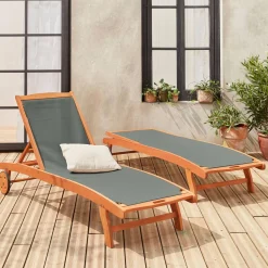 Pair of wooden and textilene sun loungers