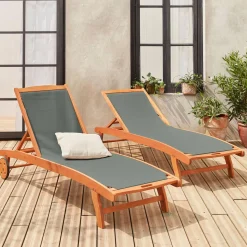 Pair of wooden and textilene sun loungers