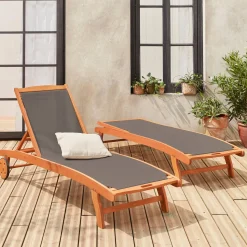 Pair of wooden and textilene sun loungers