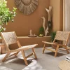 Pair of wooden chairs with straw-like resin