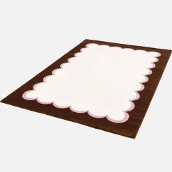 Pink and brown indoor rug