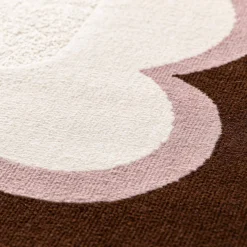 Pink and brown indoor rug
