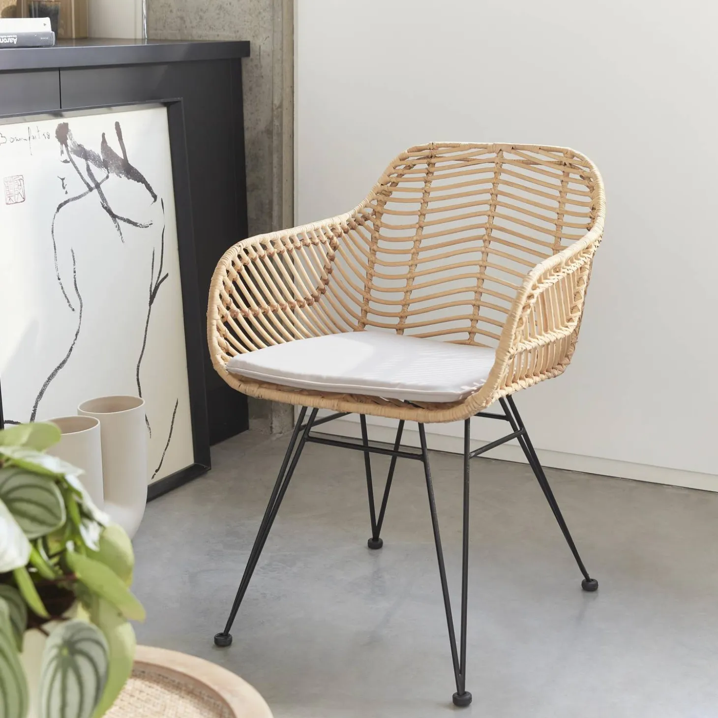 Rattan armchair with removable cushion