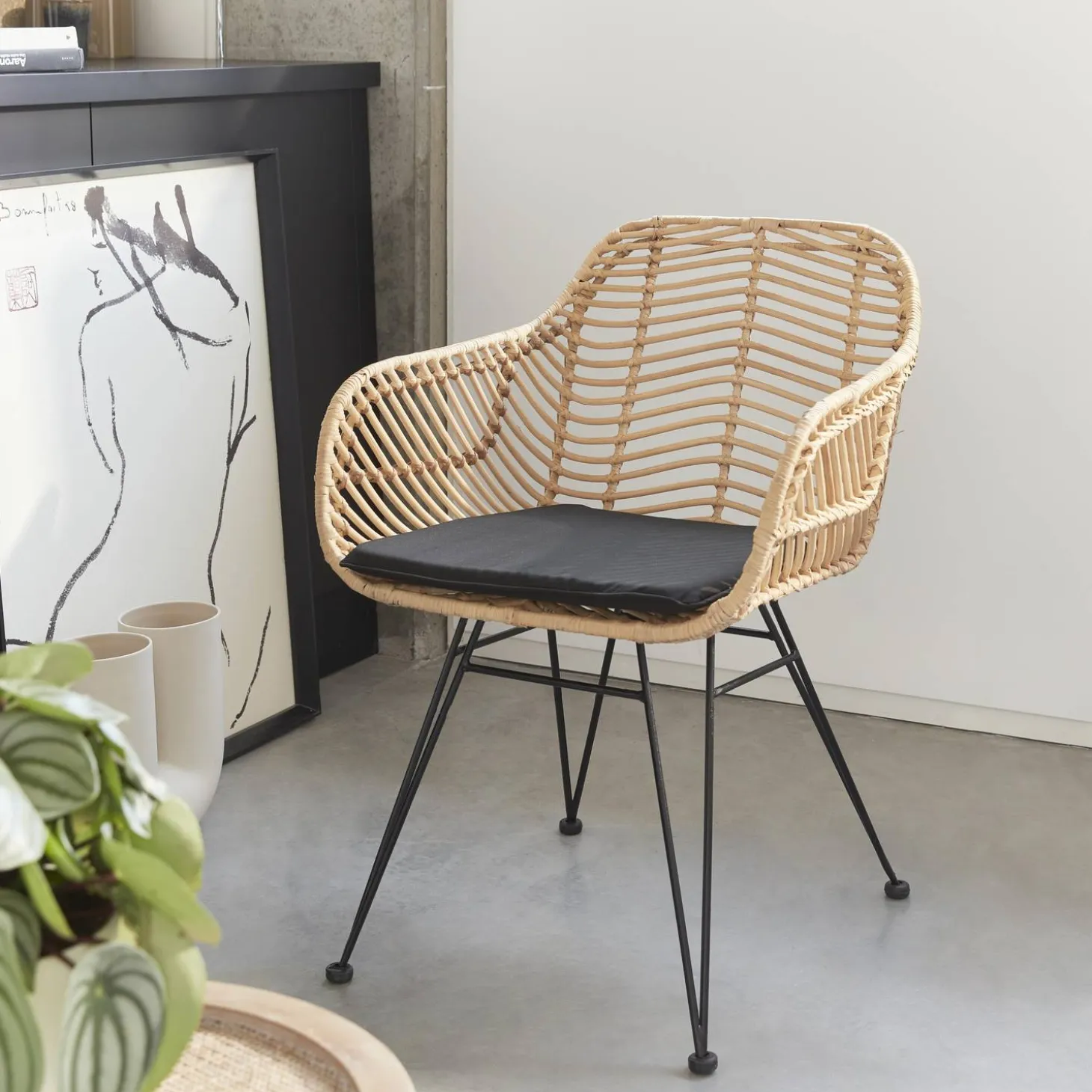 Rattan armchair with removable cushion