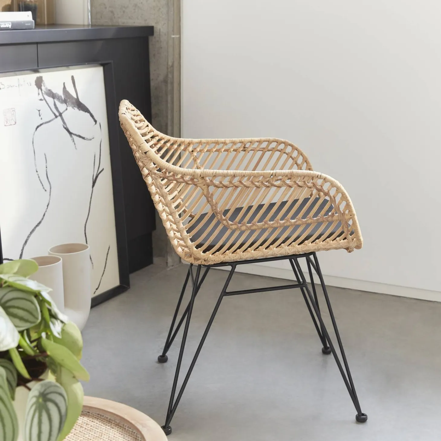 Rattan armchair with removable cushion