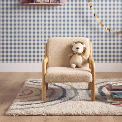 Scandinavian children's armchair in wood and bouclette fabric