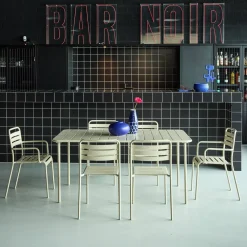 6-seater metal garden table with 2 armchairs and 4 chairs