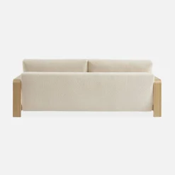 3-seater sofa bed in white boucle with wooden armrests