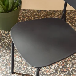 Set of 4 stackable steel and plastic garden chairs