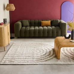 Shaggy indoor rug, rainbow geometric patterns, beige.
