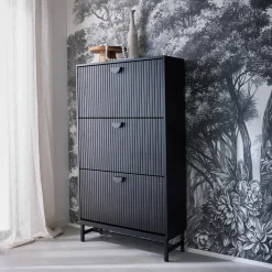 Shoe cabinet with grooved doors
