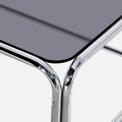 Vintage coffee table with chrome steel and tempered glass