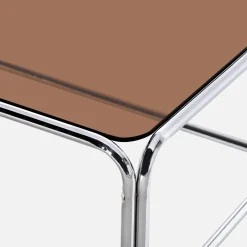 Vintage coffee table with chrome steel and tempered glass