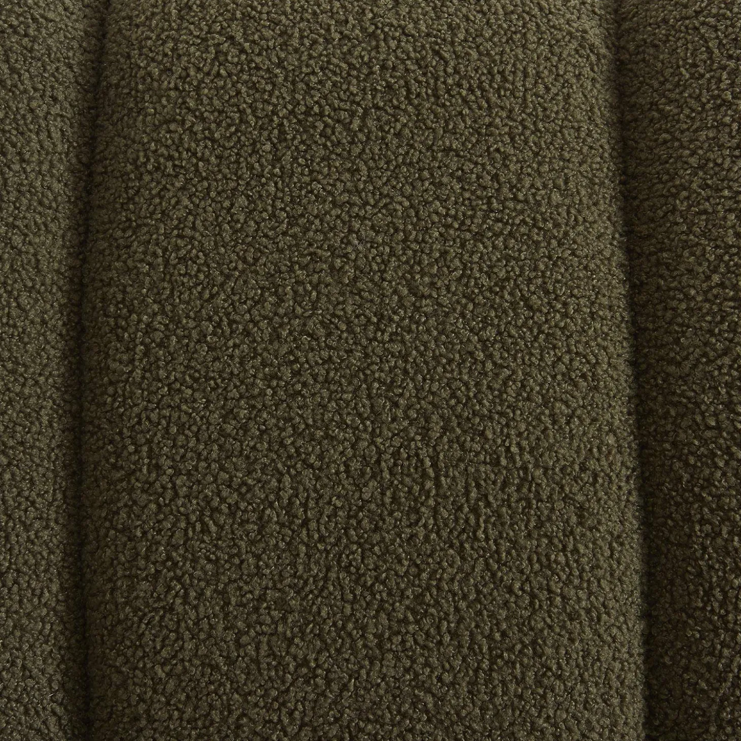 Wooden armchair with rounded legs in boucle fabric