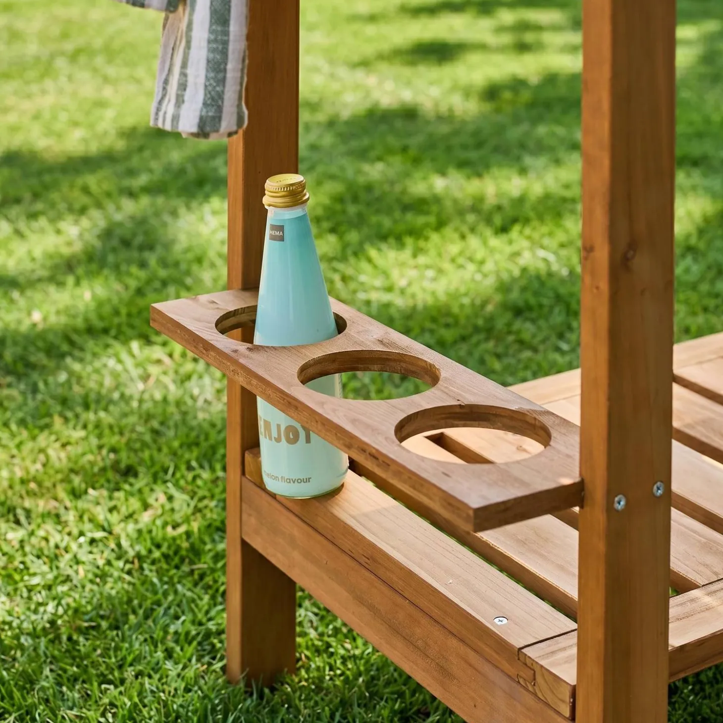Wooden barbecue sideboard with wheels and a handle