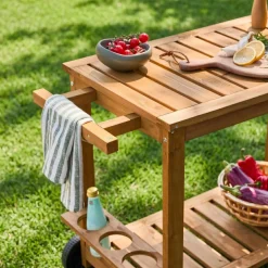 Wooden barbecue sideboard with wheels and a handle