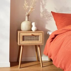 Woven rattan bedside table with drawer