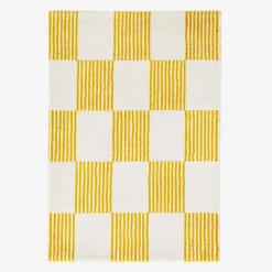 Yellow and white checkerboard interior carpet
